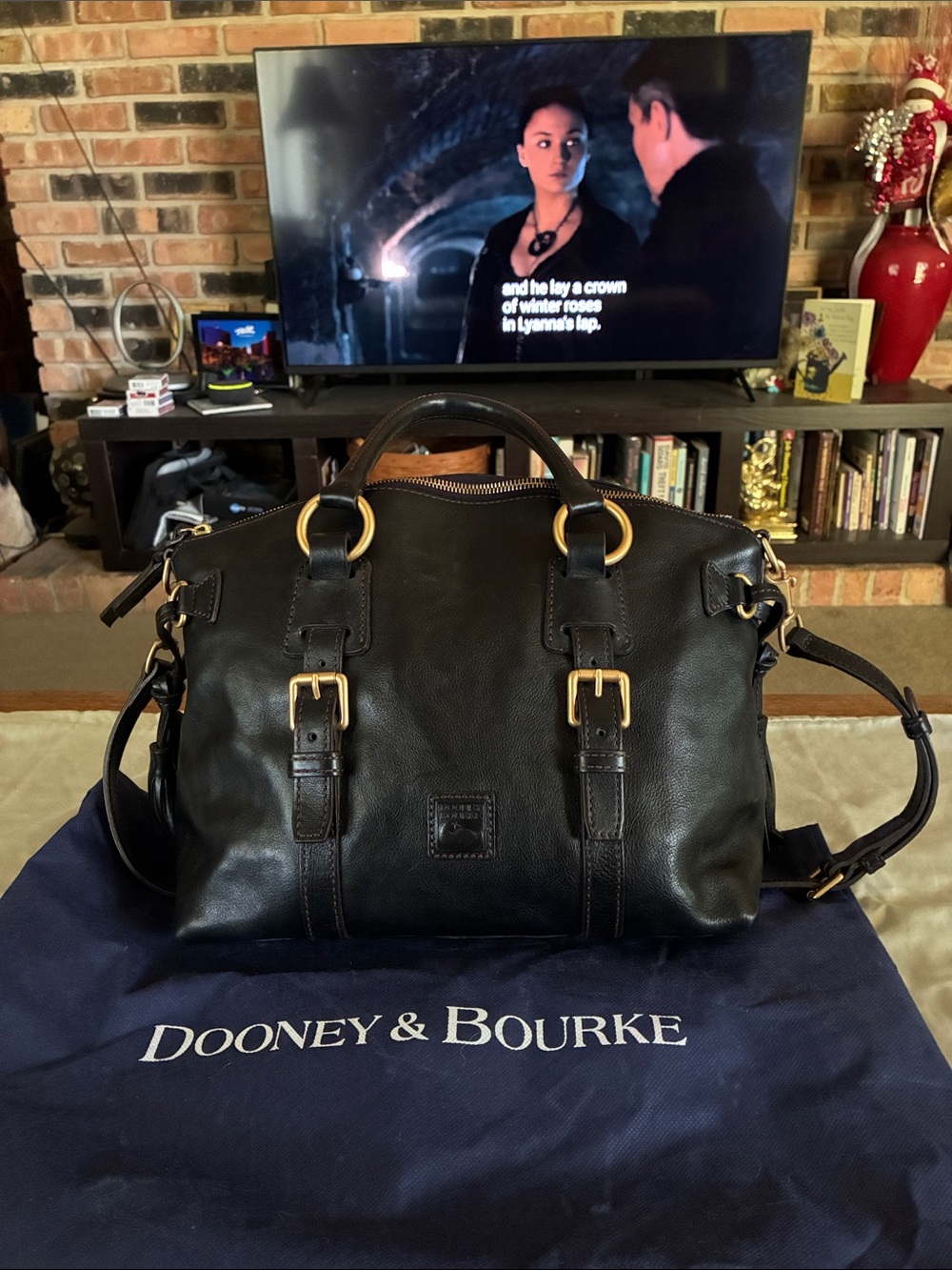 Dooney & Bourke Black Leather Duffel with Gold Hardware